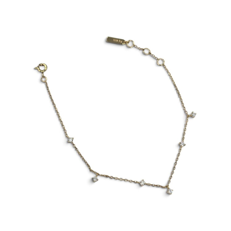 ANIA HAIE Gold Scattered Station Bracelet • Material: 925 Sterling Silver with 14kt Plating and Cubic Zirconia • Weight: 1.5g