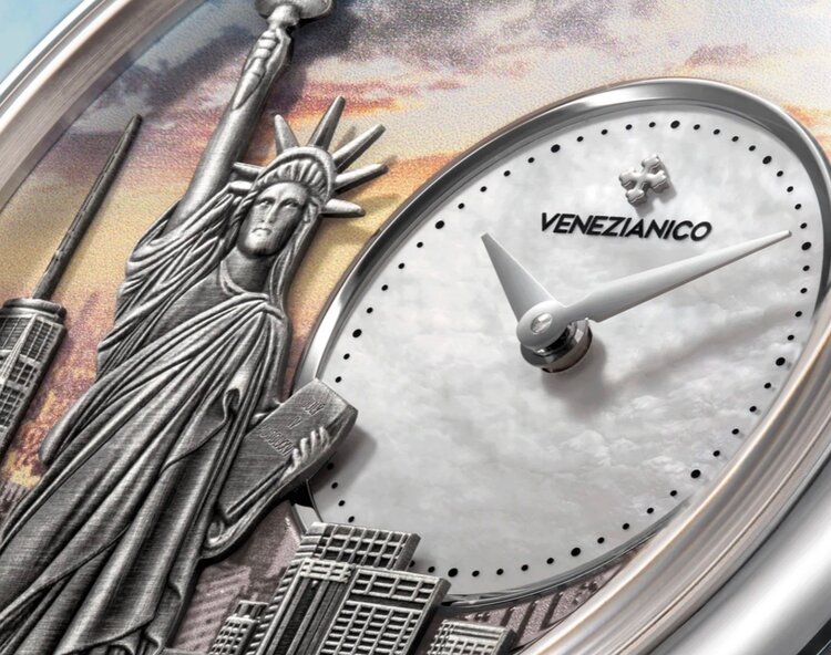 VENEZIANICO Redentore - Two Harbors Limited Edition CASE MATERIAL: 316L Stainless Steel FEATURES: Off-center dial DIAL: Four-level structure featuring mother-of-pearl and rhodium-plated bas-reliefs of Statue of Liberty DIMENSIONS: Ø40mm, 46.7mm lug to lug, 11.5mm thi