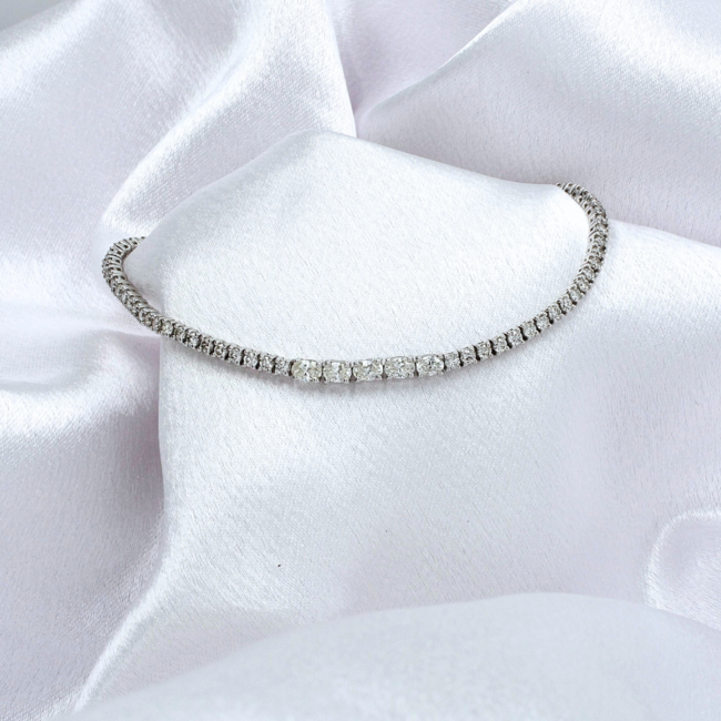 Oval & Round Brilliant Cut Diamond Tennis Bracelet in 18K White Gold