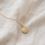 Textured Sea Shell Necklace in 10K Yellow Gold