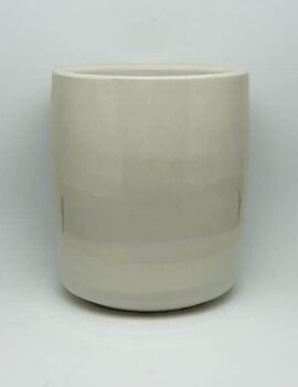 This is a matte white glaze on red clay. The combination is really