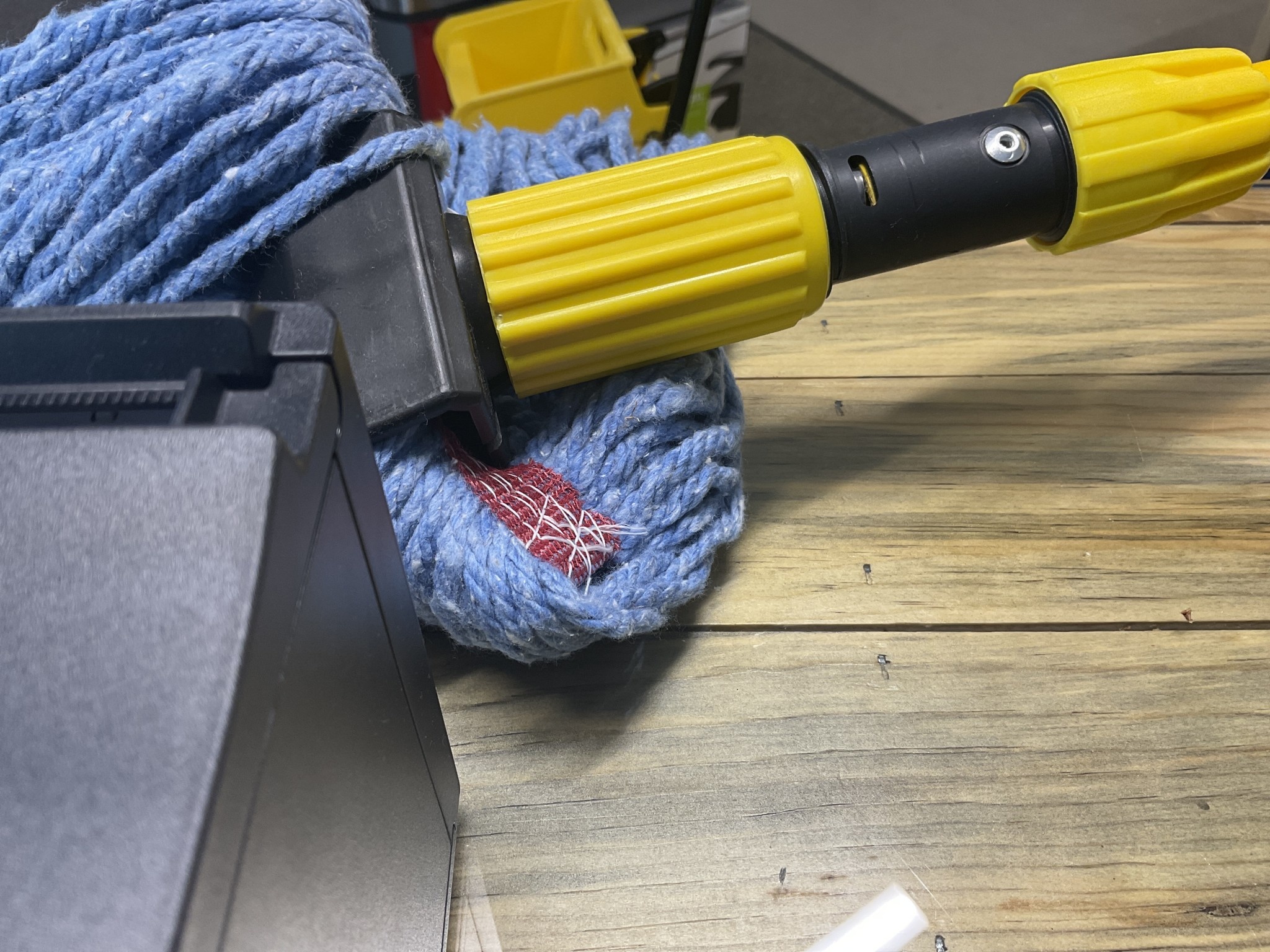 Yellow Bucket Mop handle Ripleys Vacuum Center
