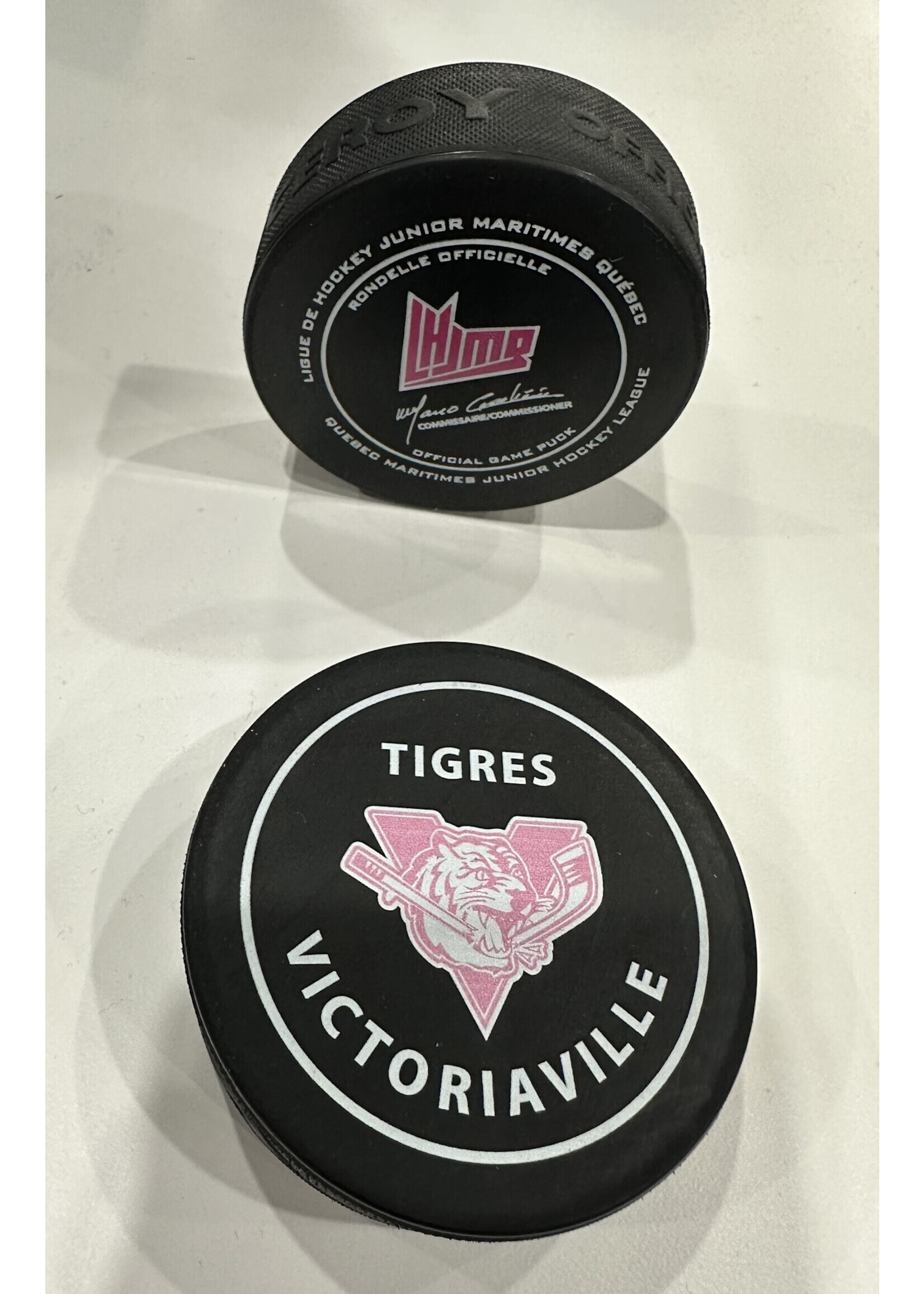 official game puck Rondelle officielle match en rose