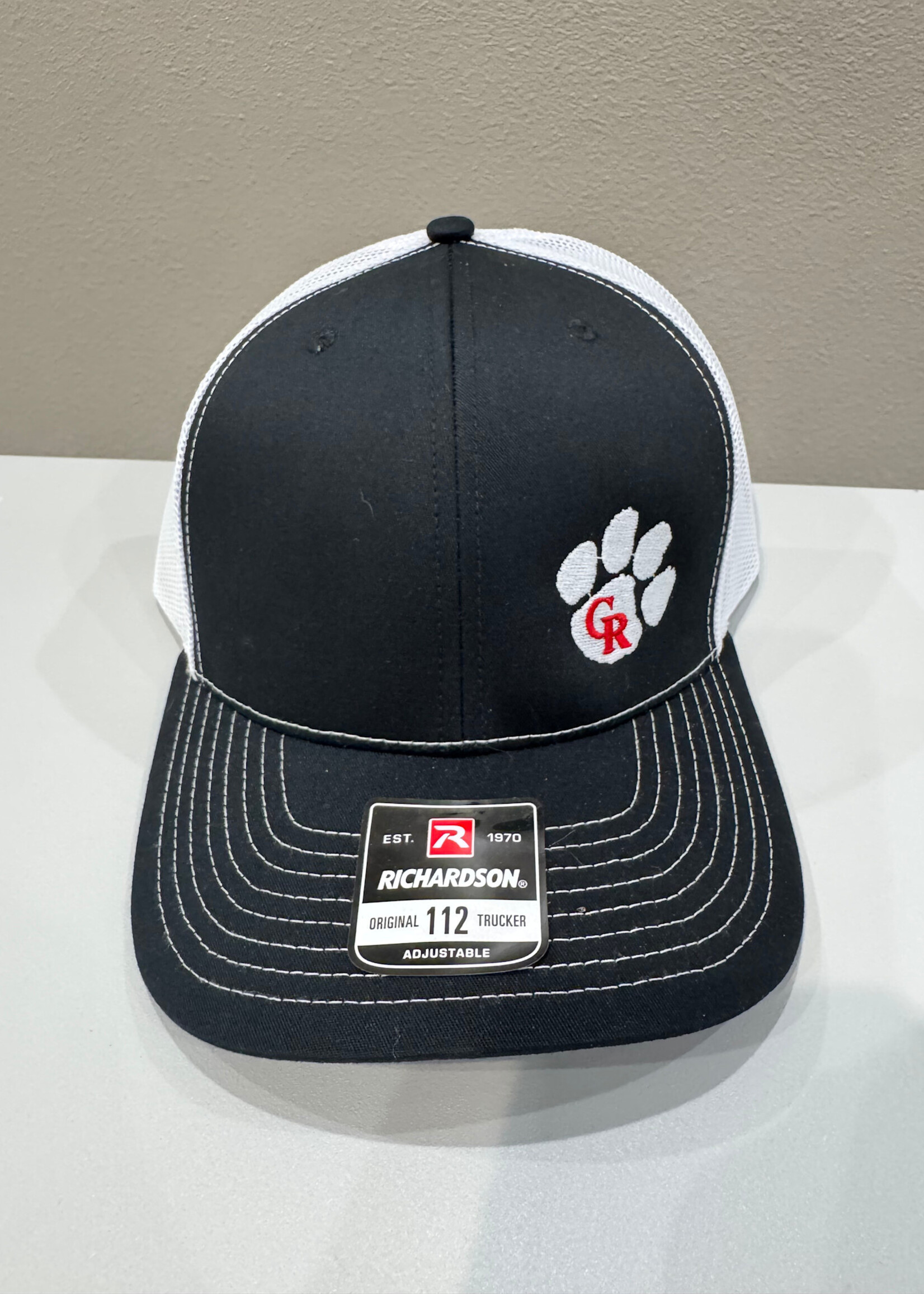 Black Hat with white paw