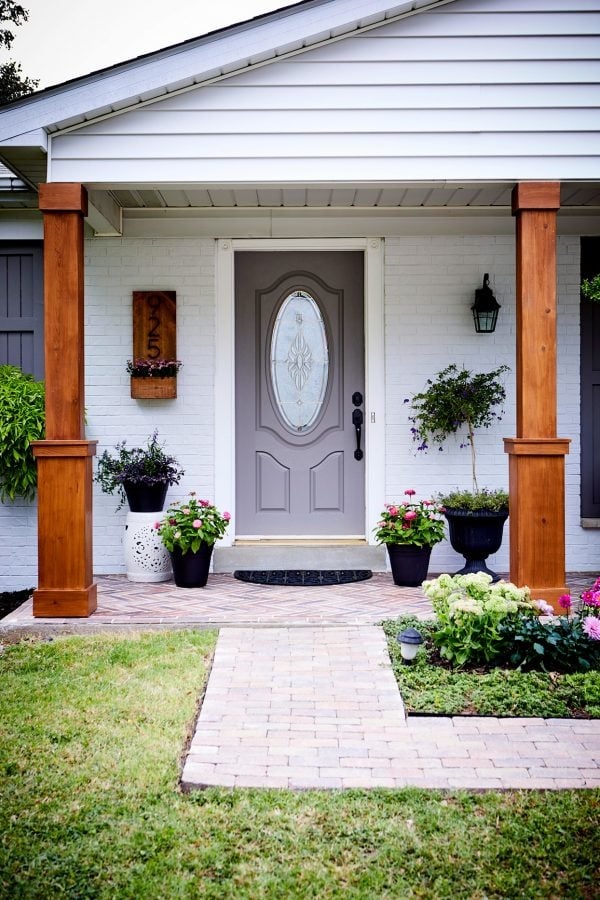 White home with black planters