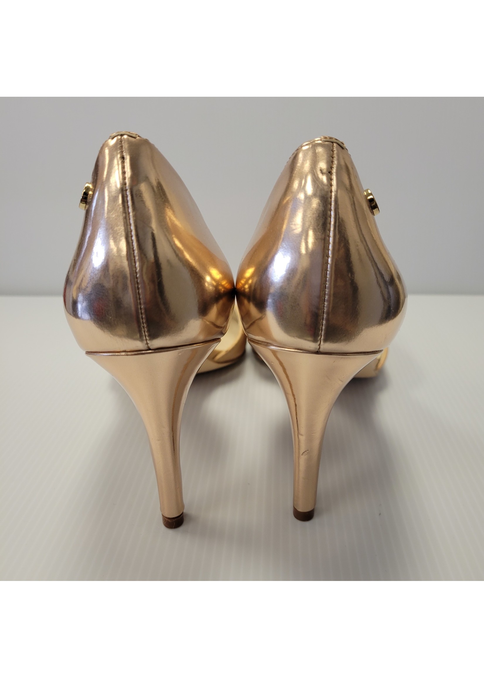 Calvin klein sales gold pumps