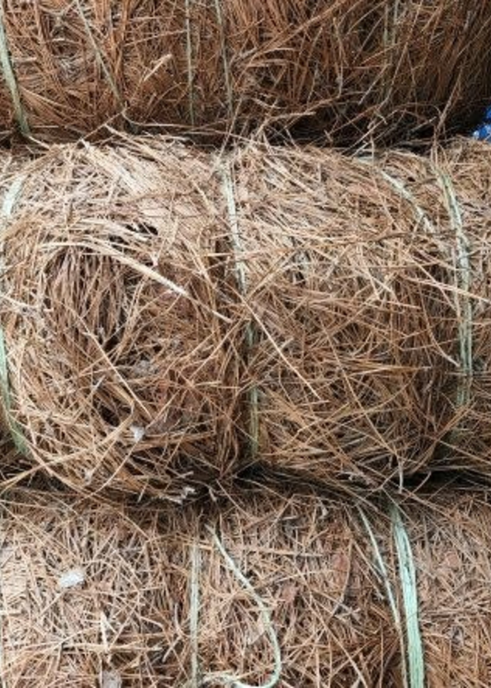 Small pine straw roll installation