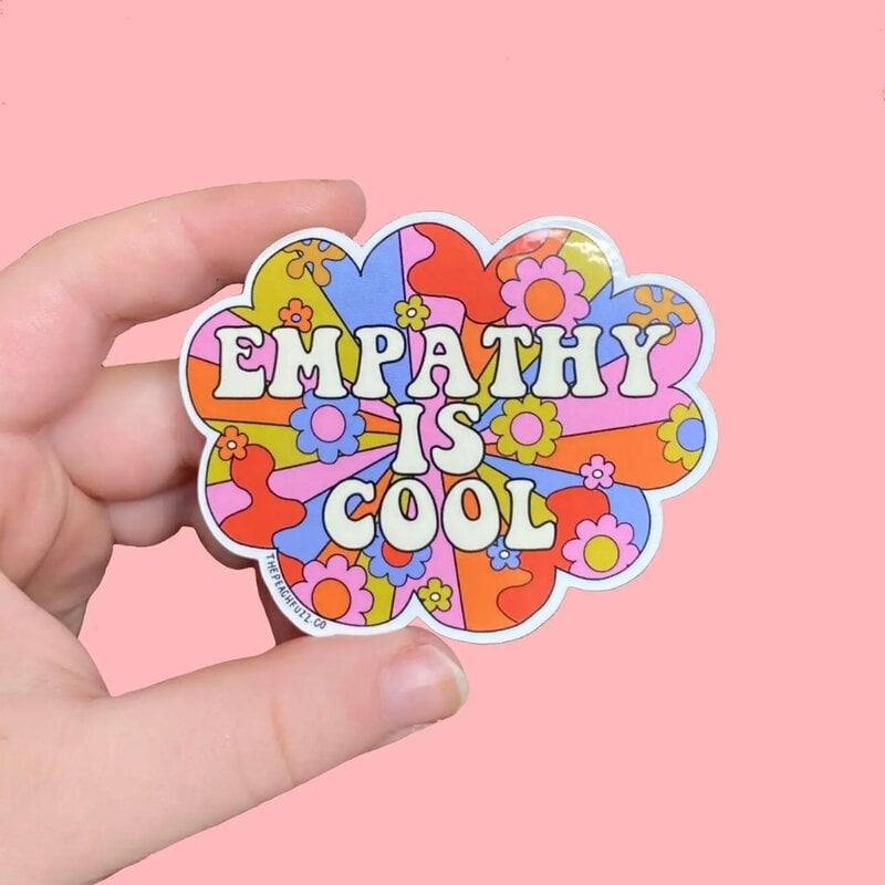 The Peach Fuzz Empathy Is Cool Sticker