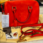 Louis Vuitton SOLD - Louis Vuitton Speedy 25 Bandoluliere Empreinte (Orange)