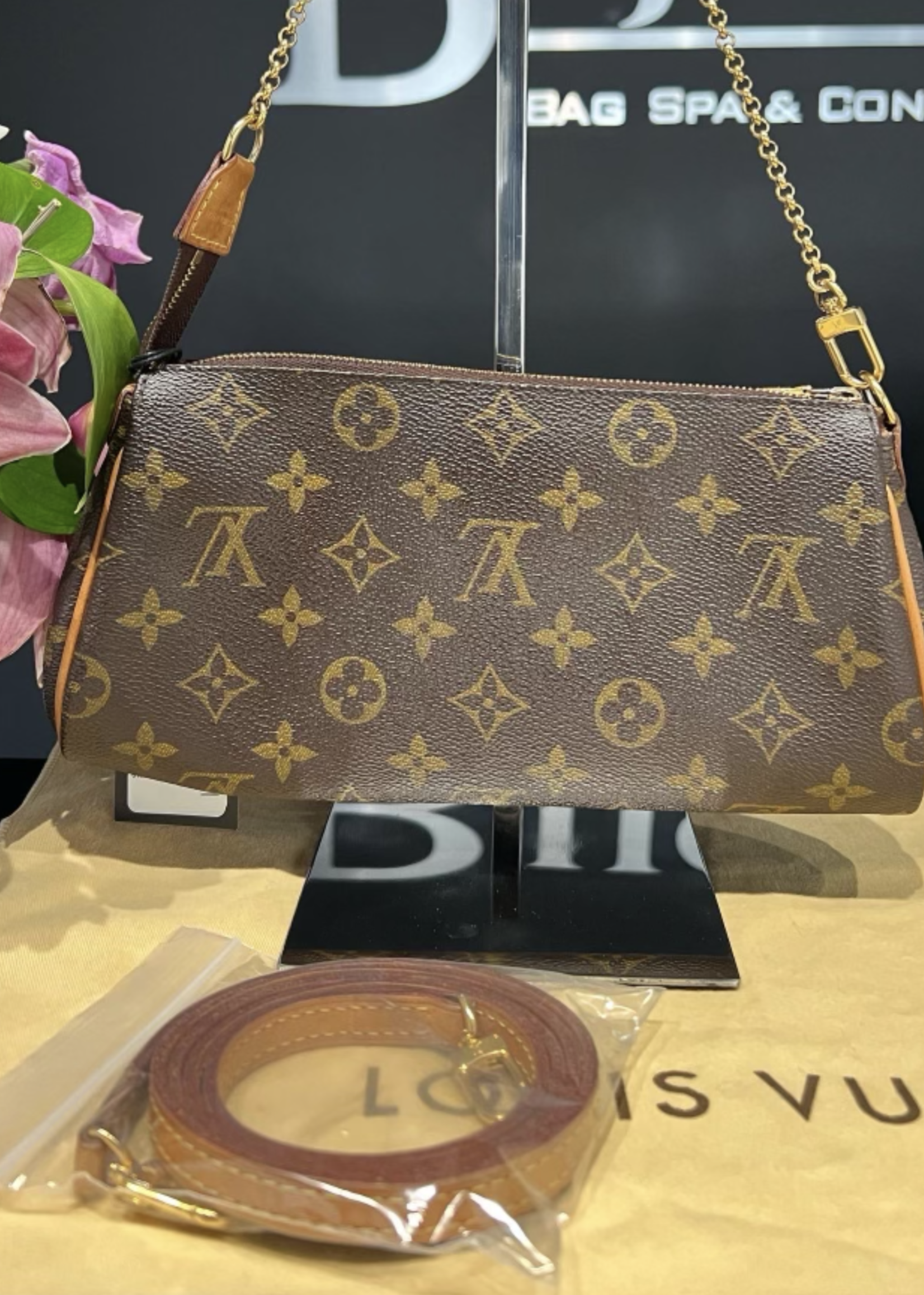 Louis Vuitton Eva Clutch - Bijoux Bag Spa & Consignment