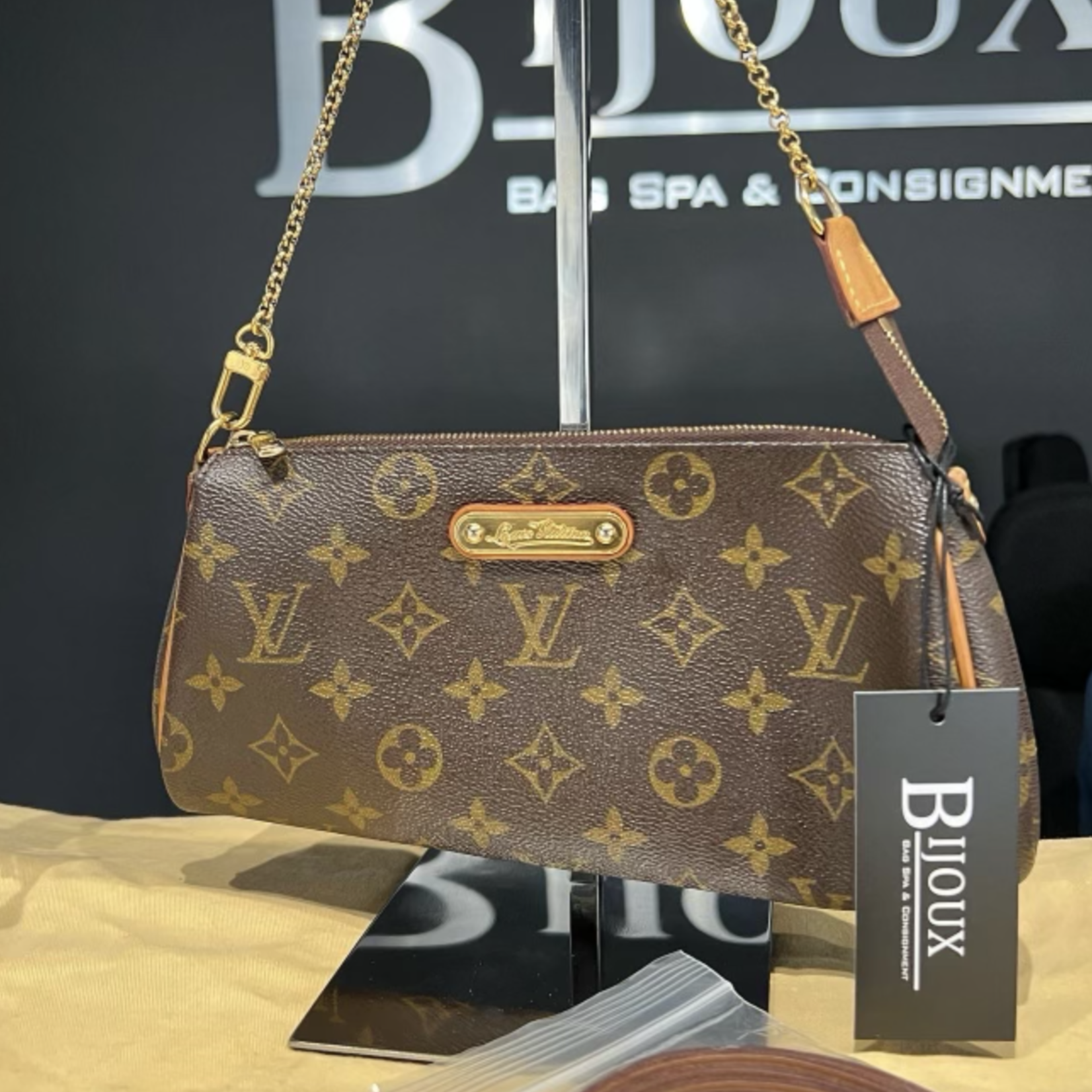 Eva handbag Louis Vuitton Brown in Cotton  25633468