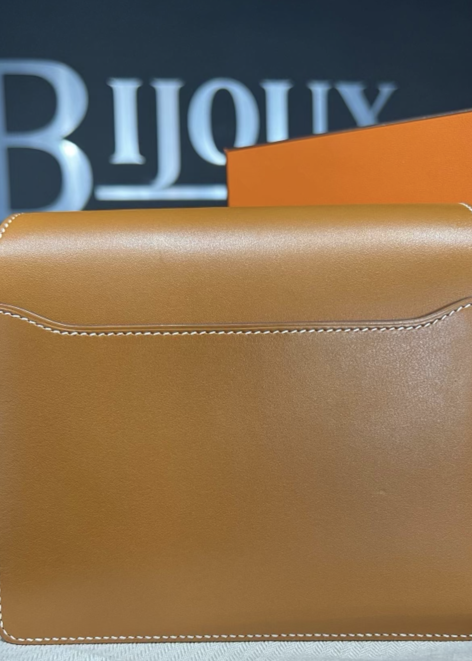 Hermes SOLD - Hermes Roulis Mini Gold In Swift Leather GHW