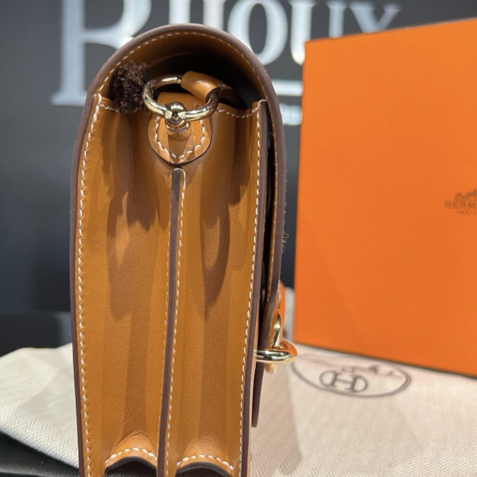 Hermes SOLD - Hermes Roulis Mini Gold In Swift Leather GHW