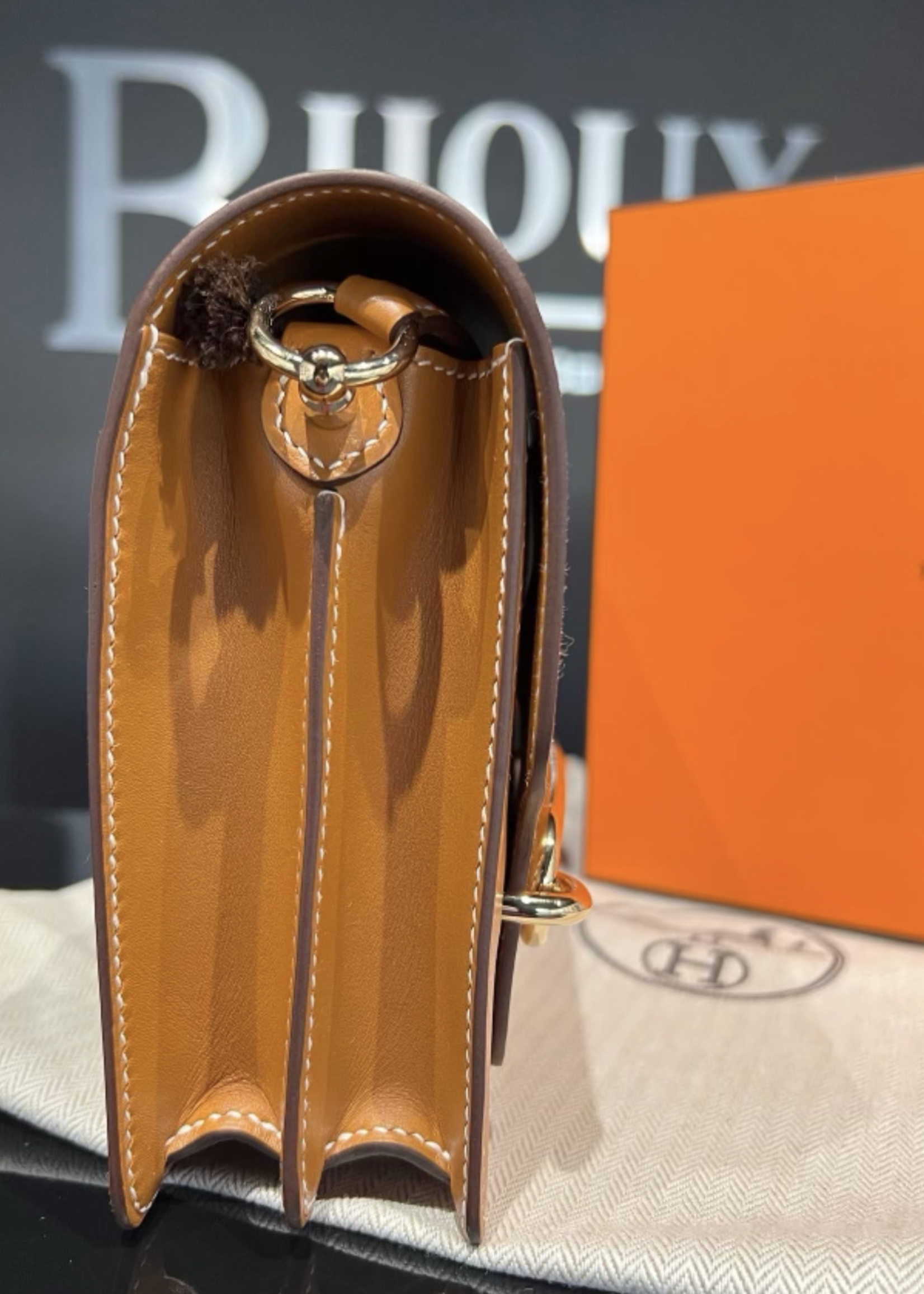 Hermes SOLD - Hermes Roulis Mini Gold In Swift Leather GHW