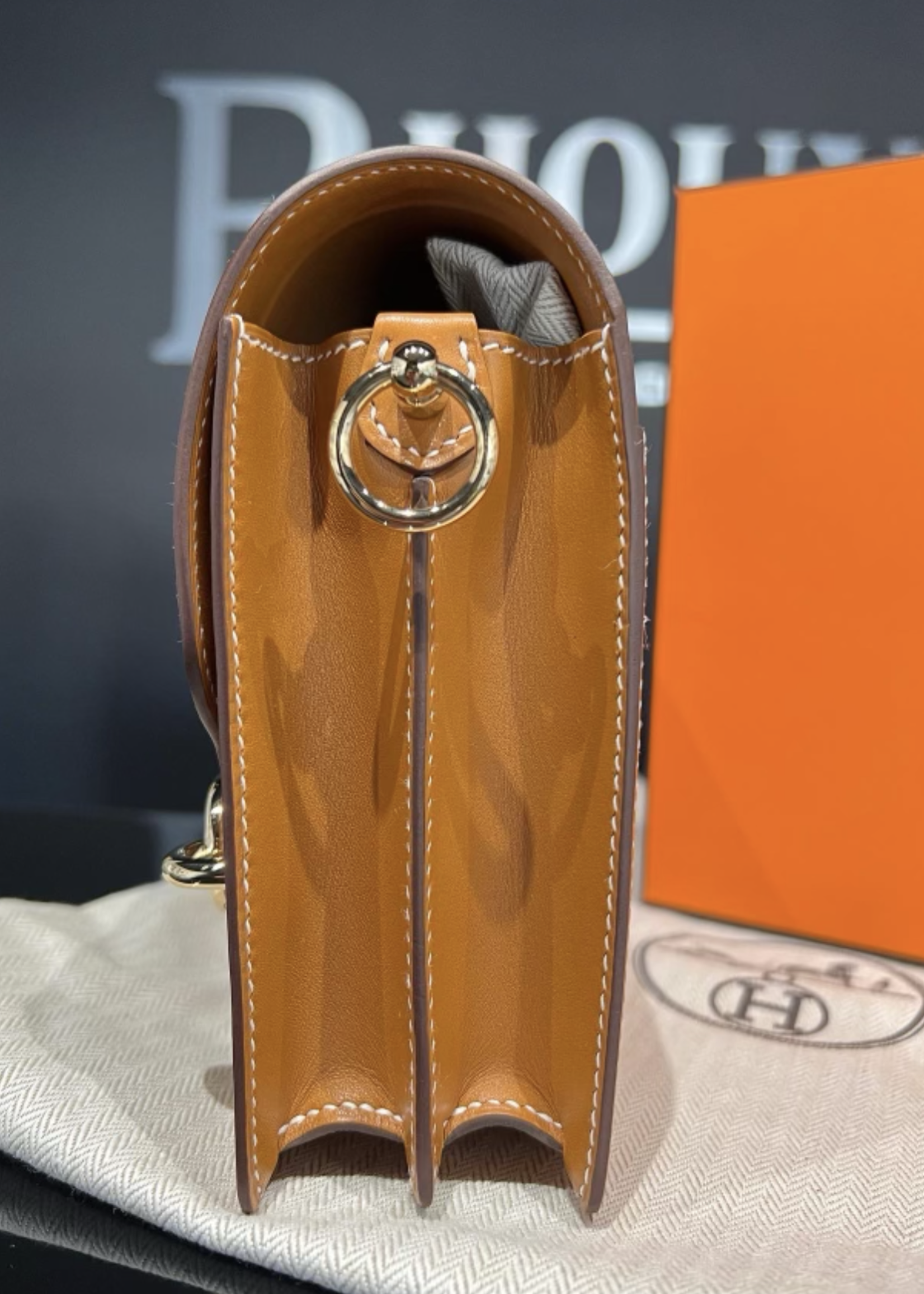 Hermes SOLD - Hermes Roulis Mini Gold In Swift Leather GHW