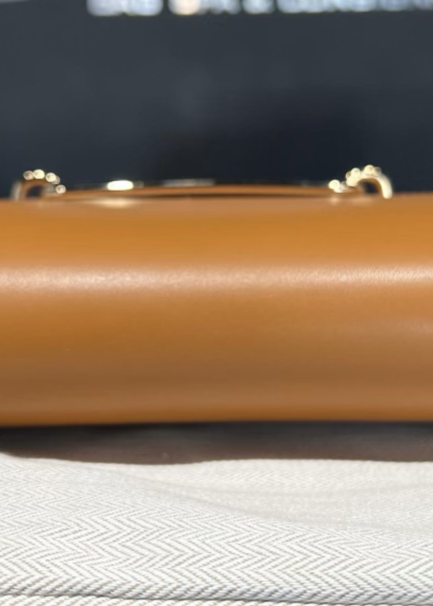 Hermes SOLD - Hermes Roulis Mini Gold In Swift Leather GHW