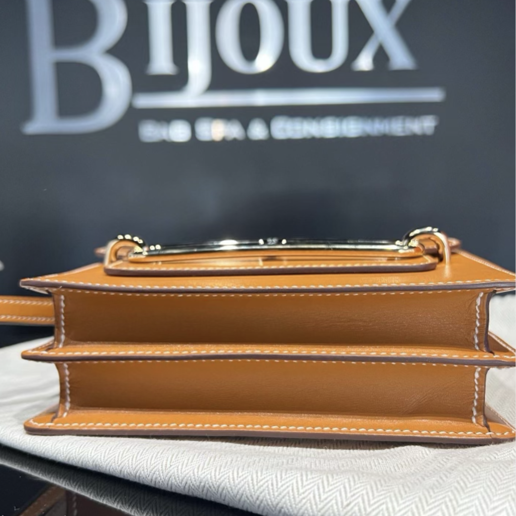 Hermes SOLD - Hermes Roulis Mini Gold In Swift Leather GHW