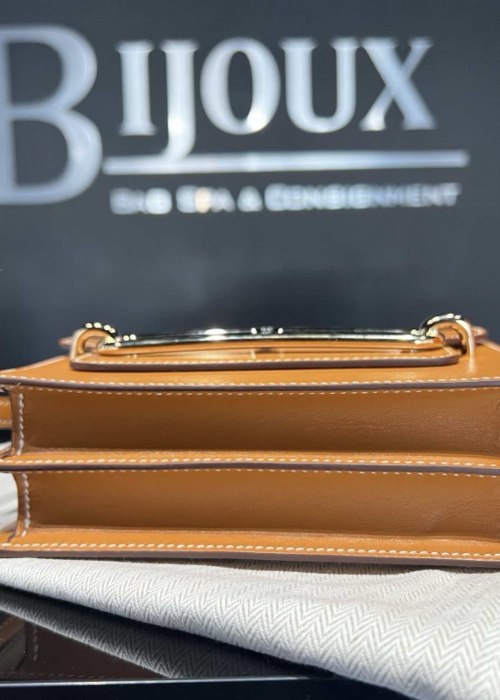 Hermes SOLD - Hermes Roulis Mini Gold In Swift Leather GHW