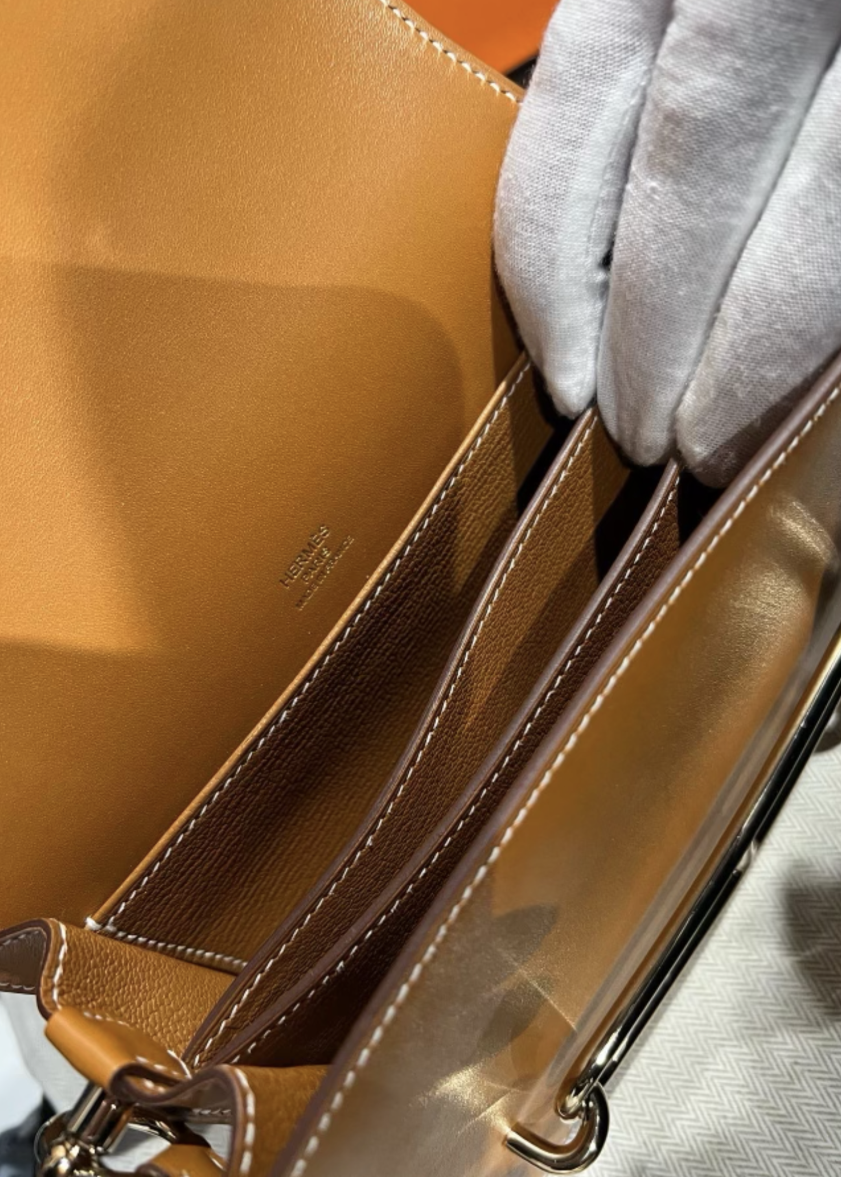 Hermes SOLD - Hermes Roulis Mini Gold In Swift Leather GHW