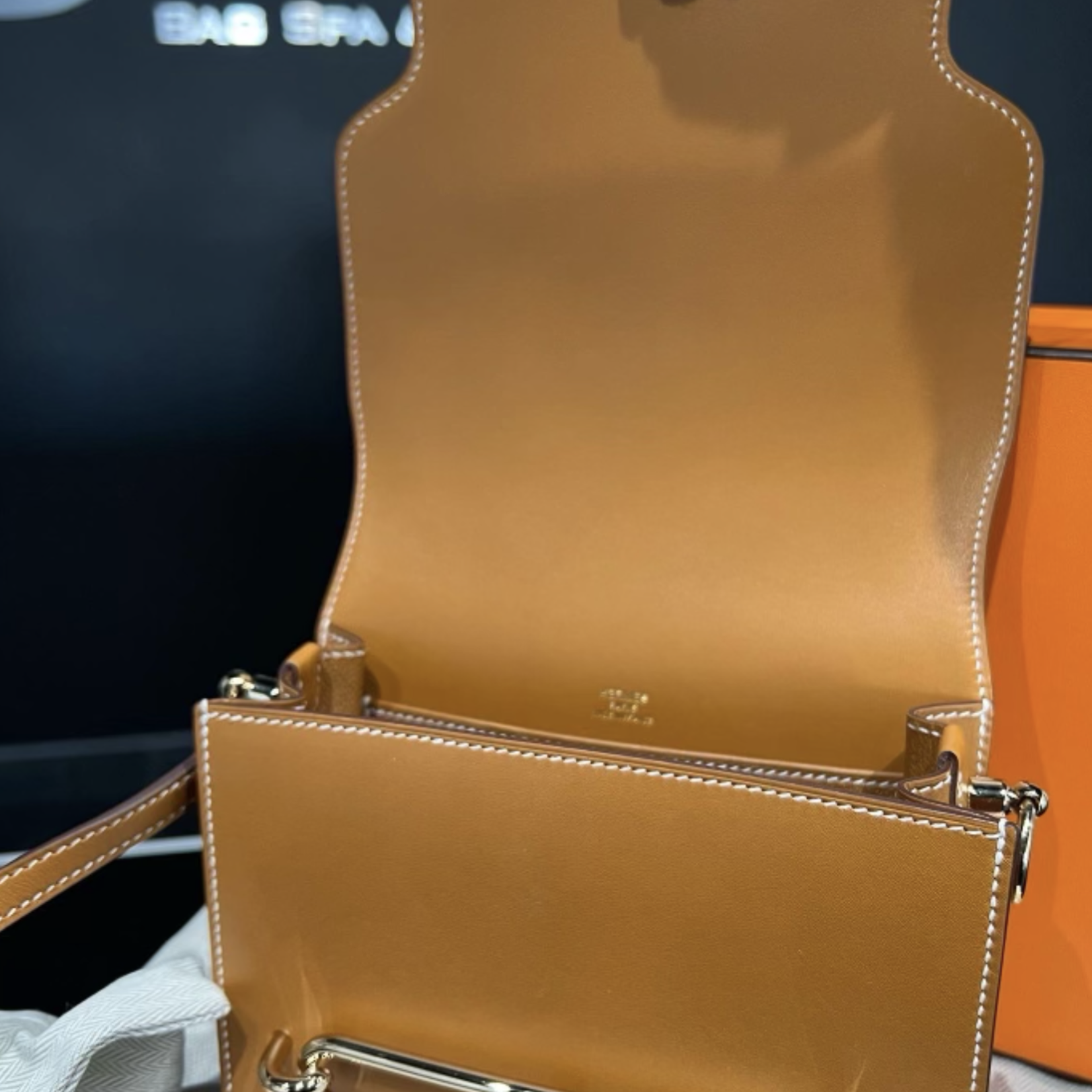 Hermes SOLD - Hermes Roulis Mini Gold In Swift Leather GHW