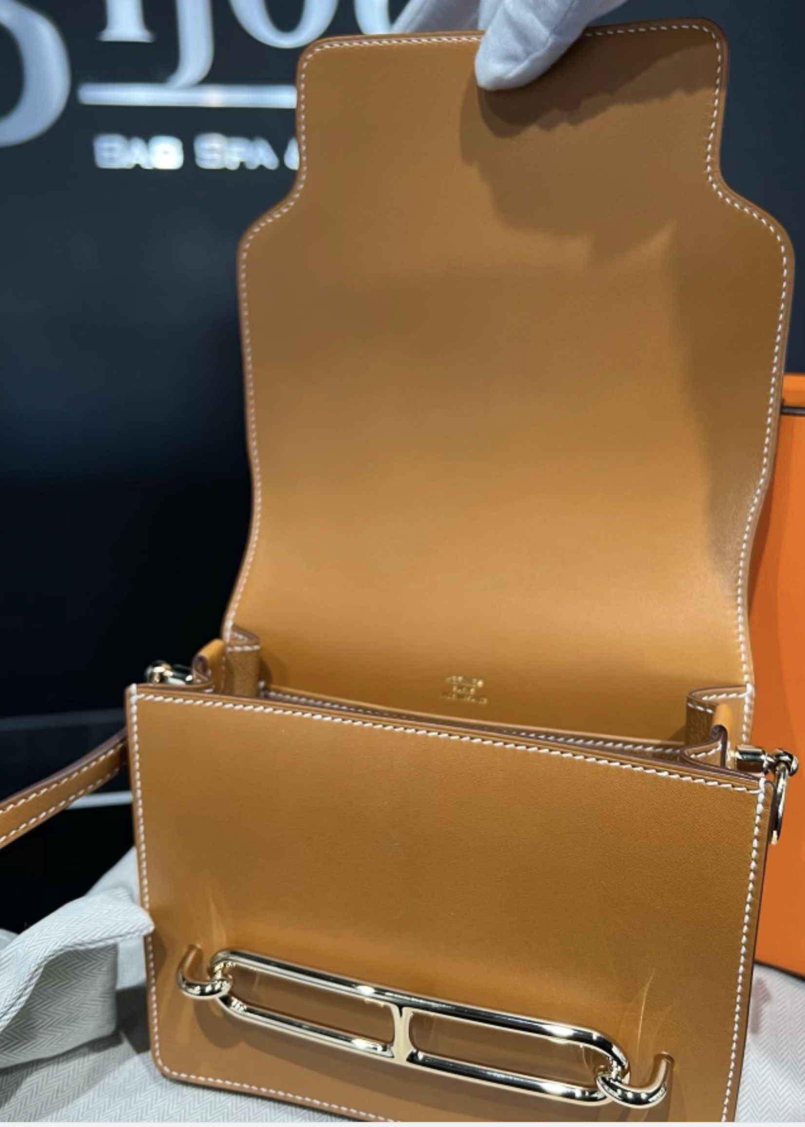 Hermes SOLD - Hermes Roulis Mini Gold In Swift Leather GHW