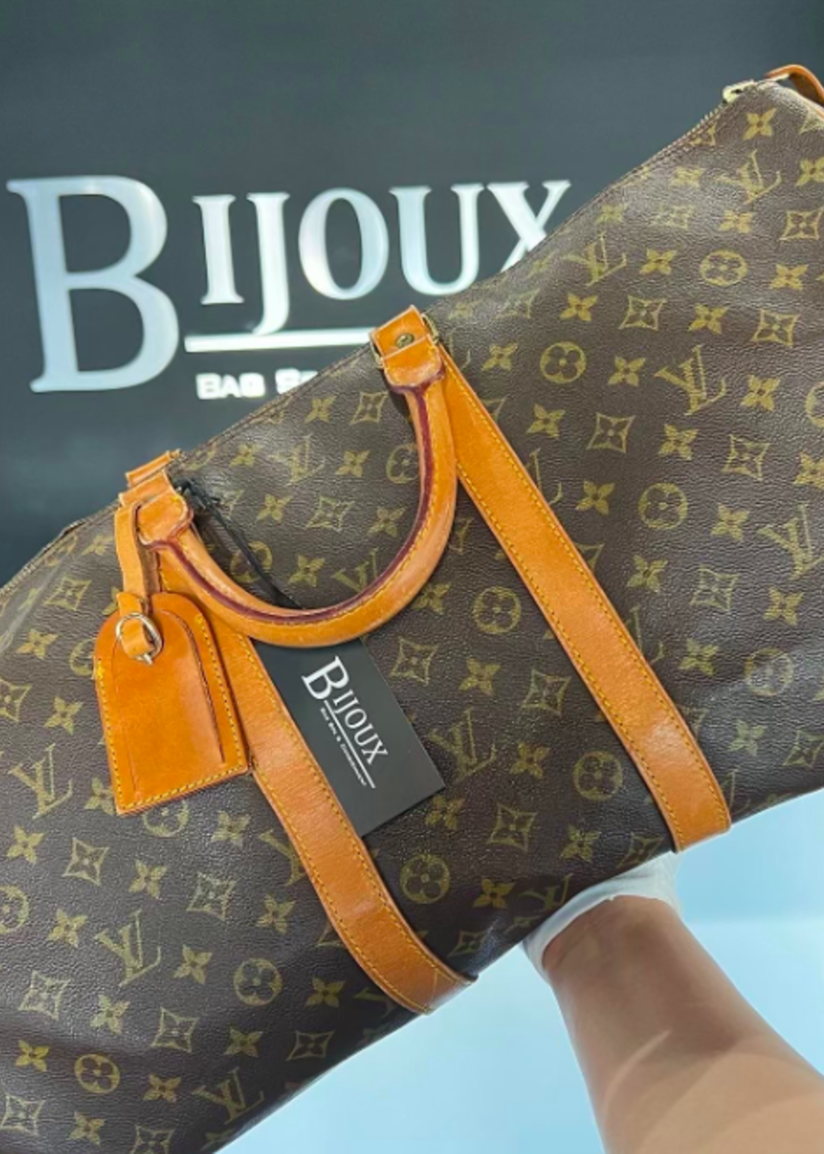Louis Vuitton Vintage Keepall 55 - Bijoux Bag Spa & Consignment