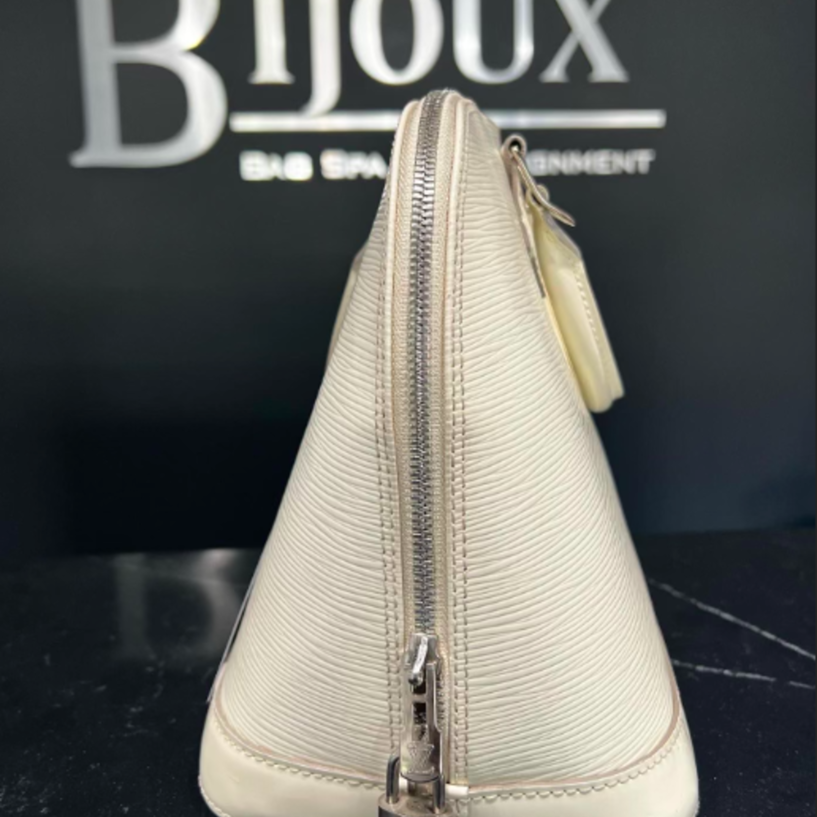 Louis Vuitton SOLD - LOUIS VUITTON ALMA PM EPI LEATHER WHITE