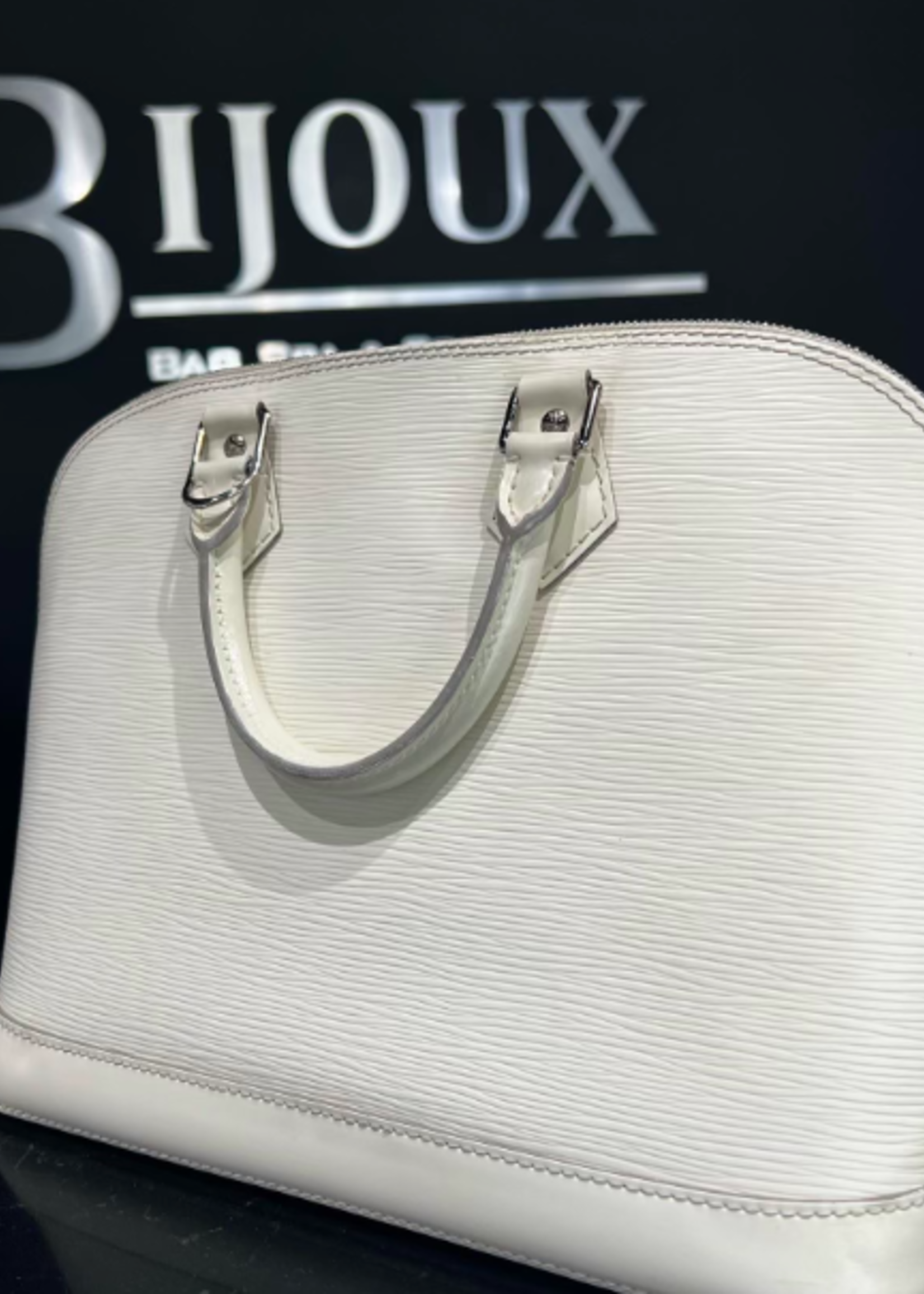 Louis Vuitton SOLD - LOUIS VUITTON ALMA PM EPI LEATHER WHITE