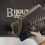 Chanel SOLD - Chanel Black Jumbo Chevron Stitch Lambskin Purse GHW