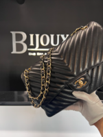 Chanel SOLD - Chanel Black Jumbo Chevron Stitch Lambskin Purse GHW