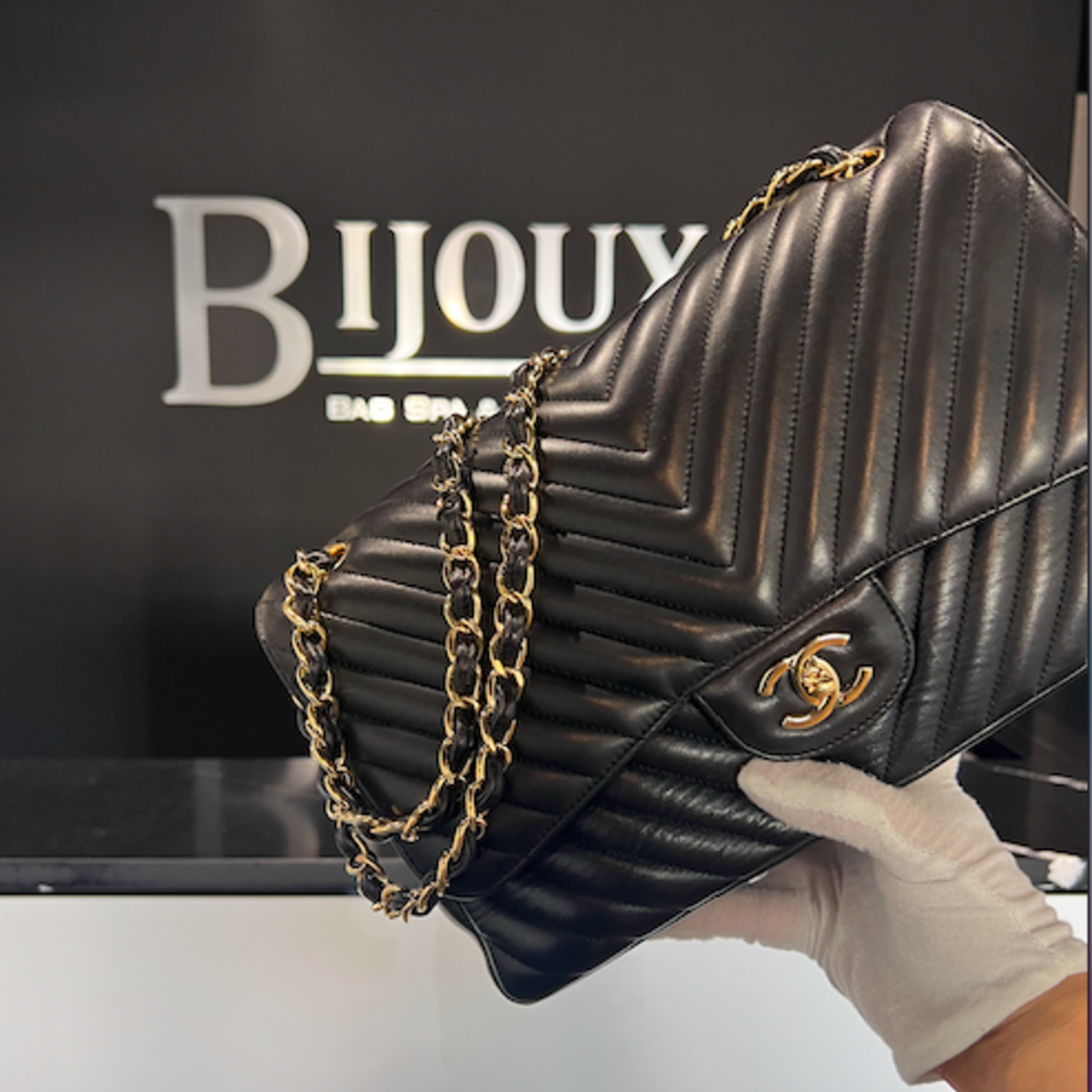 Chanel SOLD - Chanel Black Jumbo Chevron Stitch Lambskin Purse GHW