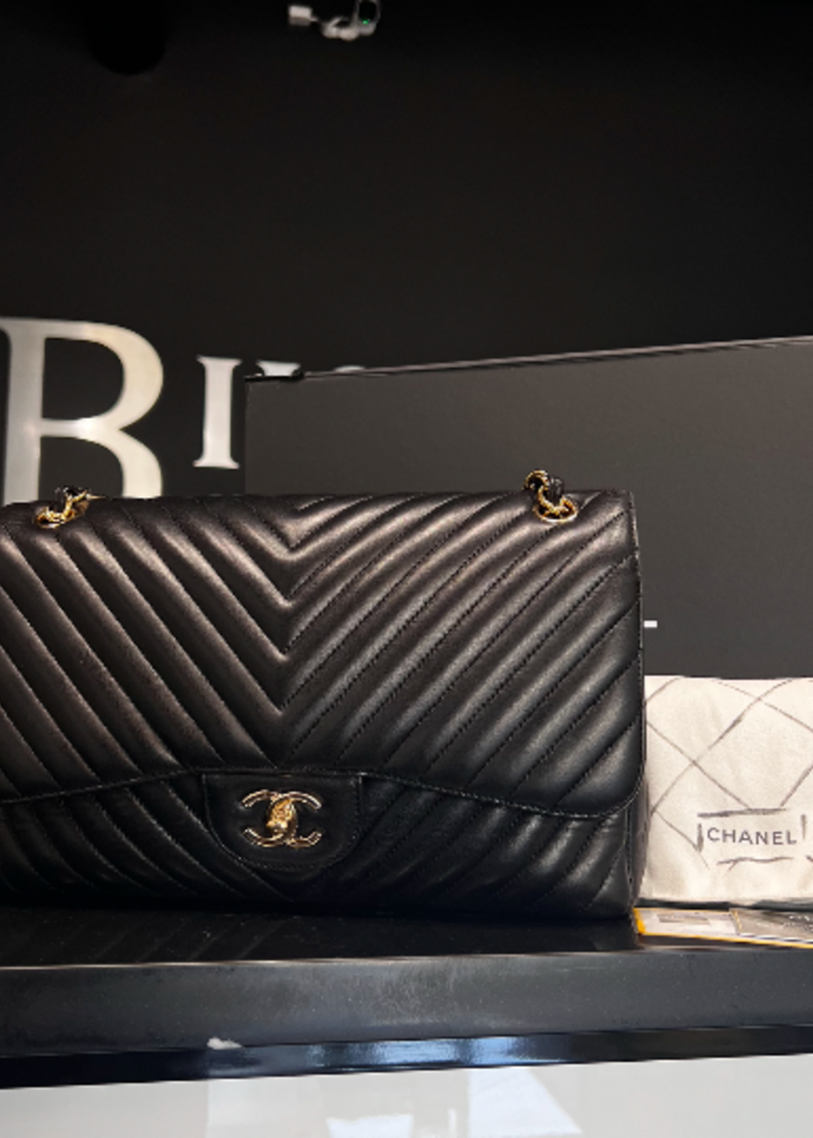 Chanel SOLD - Chanel Black Jumbo Chevron Stitch Lambskin Purse GHW