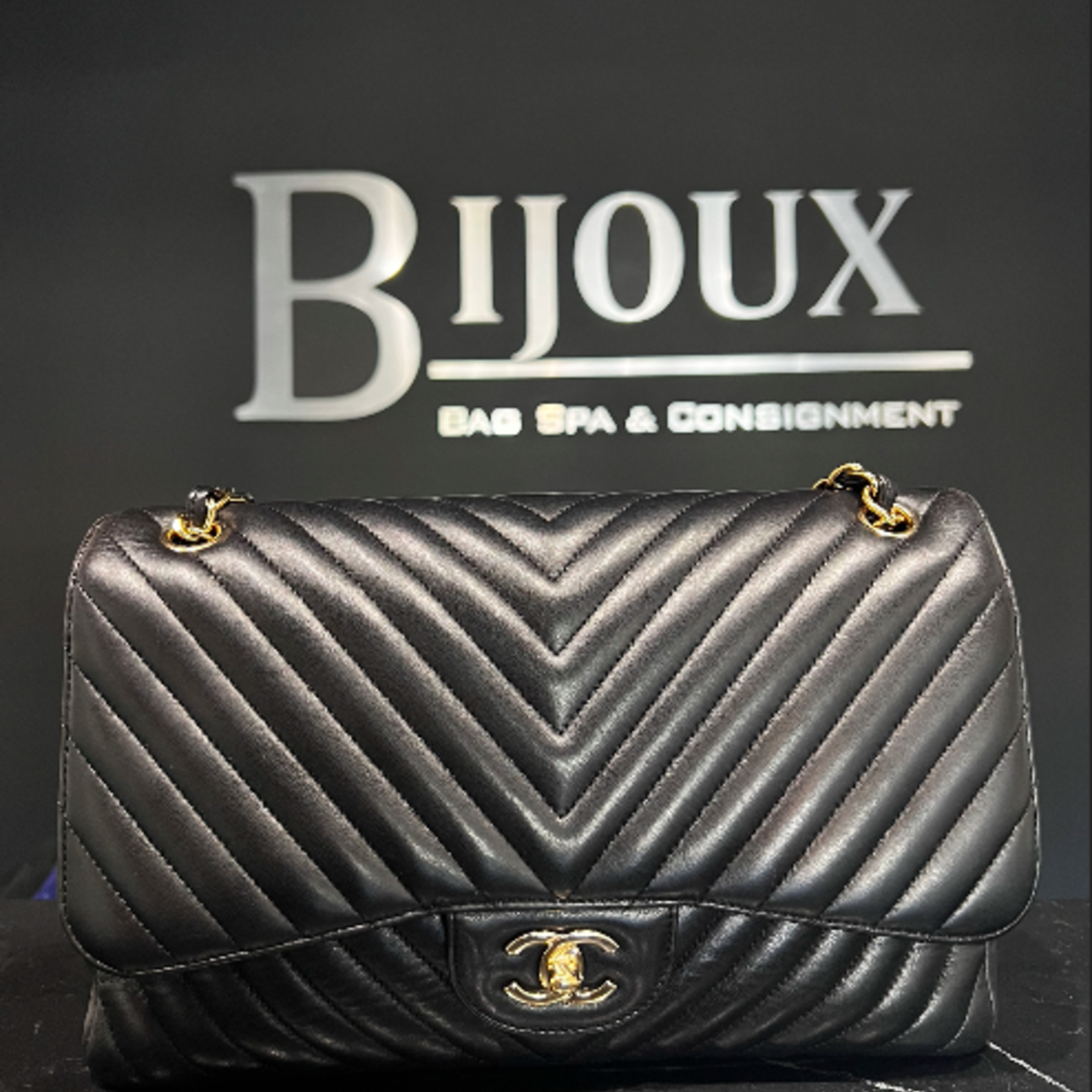 Chanel SOLD - Chanel Black Jumbo Chevron Stitch Lambskin Purse GHW