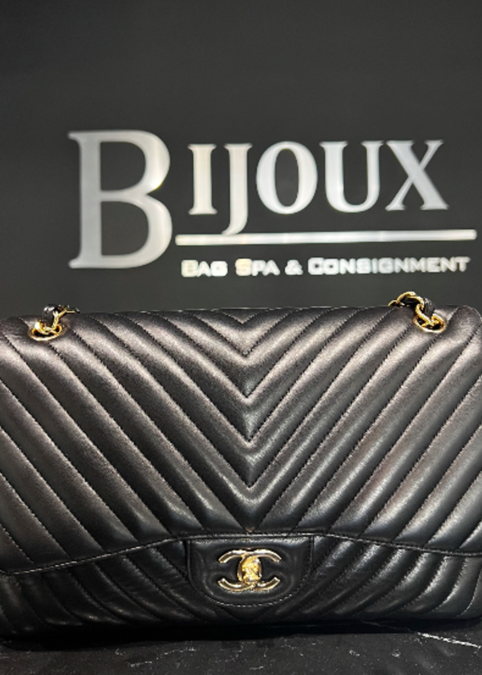 Chanel SOLD - Chanel Black Jumbo Chevron Stitch Lambskin Purse GHW