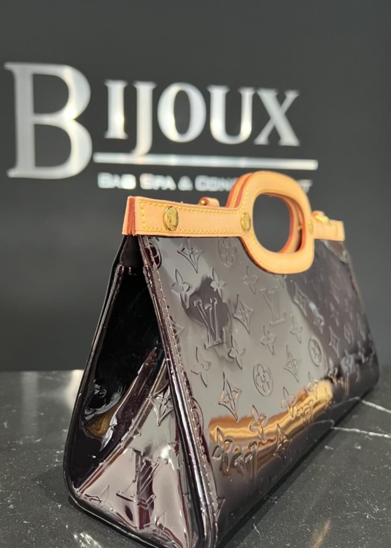 Louis Vuitton SOLD - Louis Vuitton Roxbury Amarante