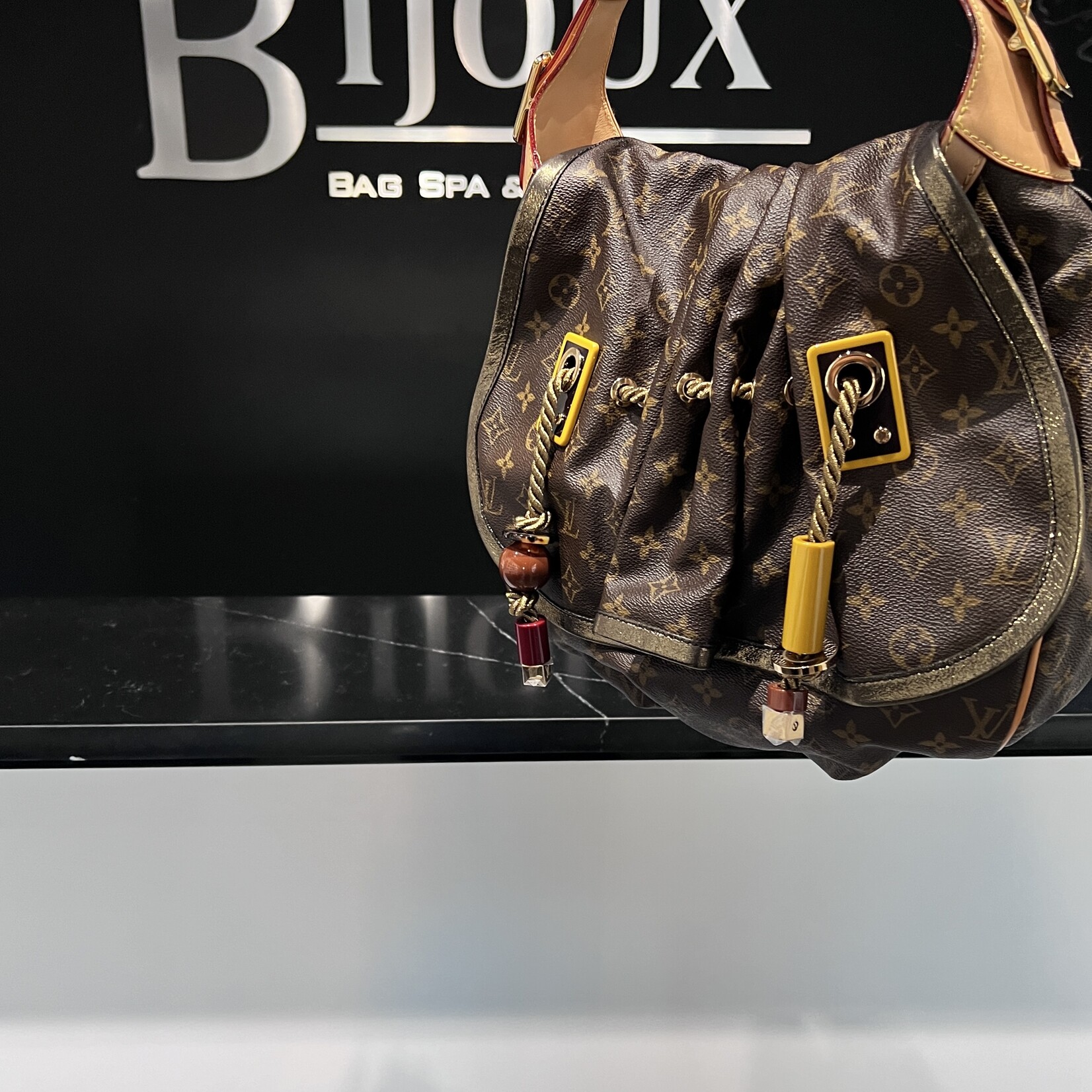 Louis Vuitton SOLD- Louis Vuitton Kalahari Tassle