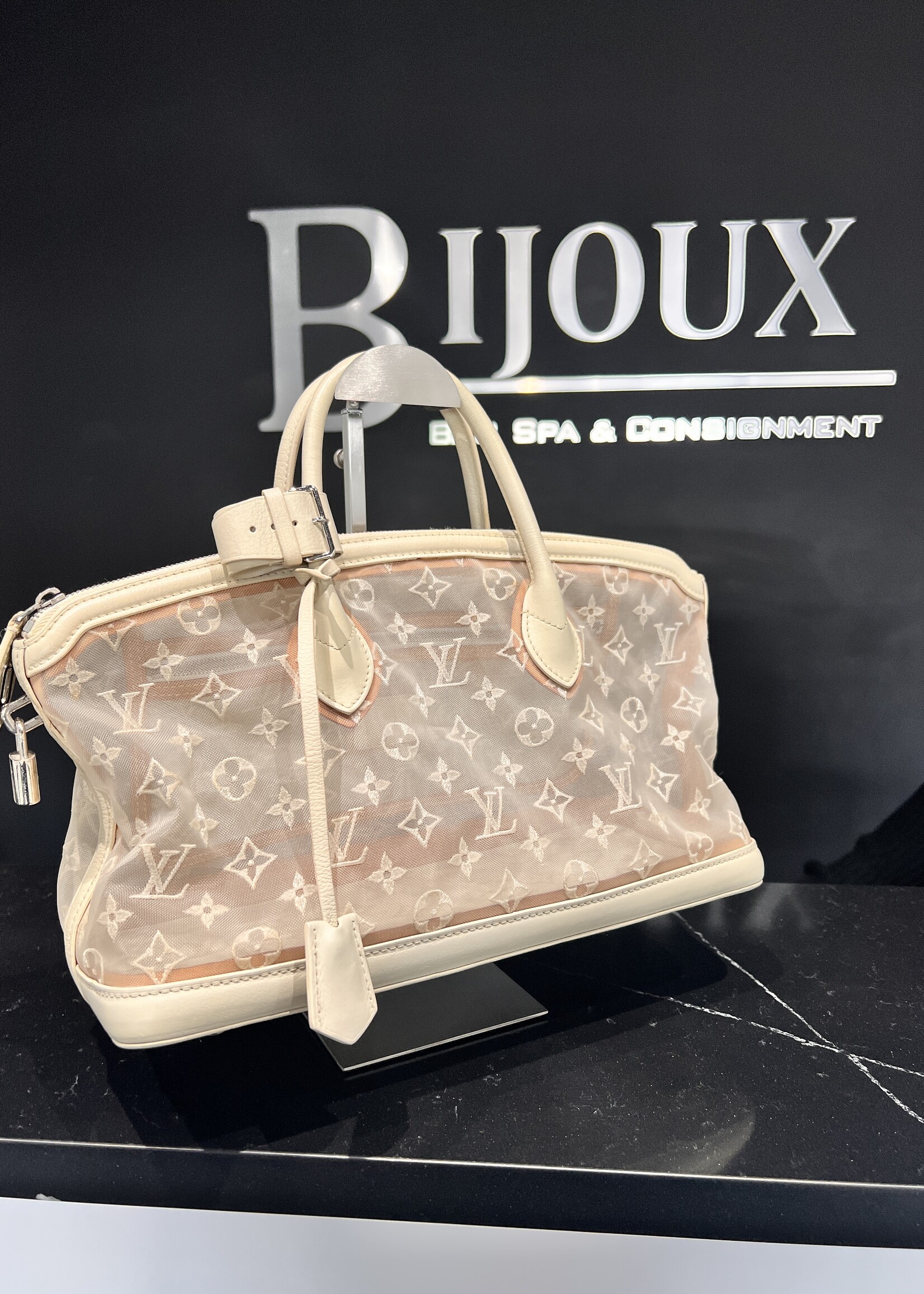 Louis Vuitton SOLD - Louis Vuitton Transparence Lock It