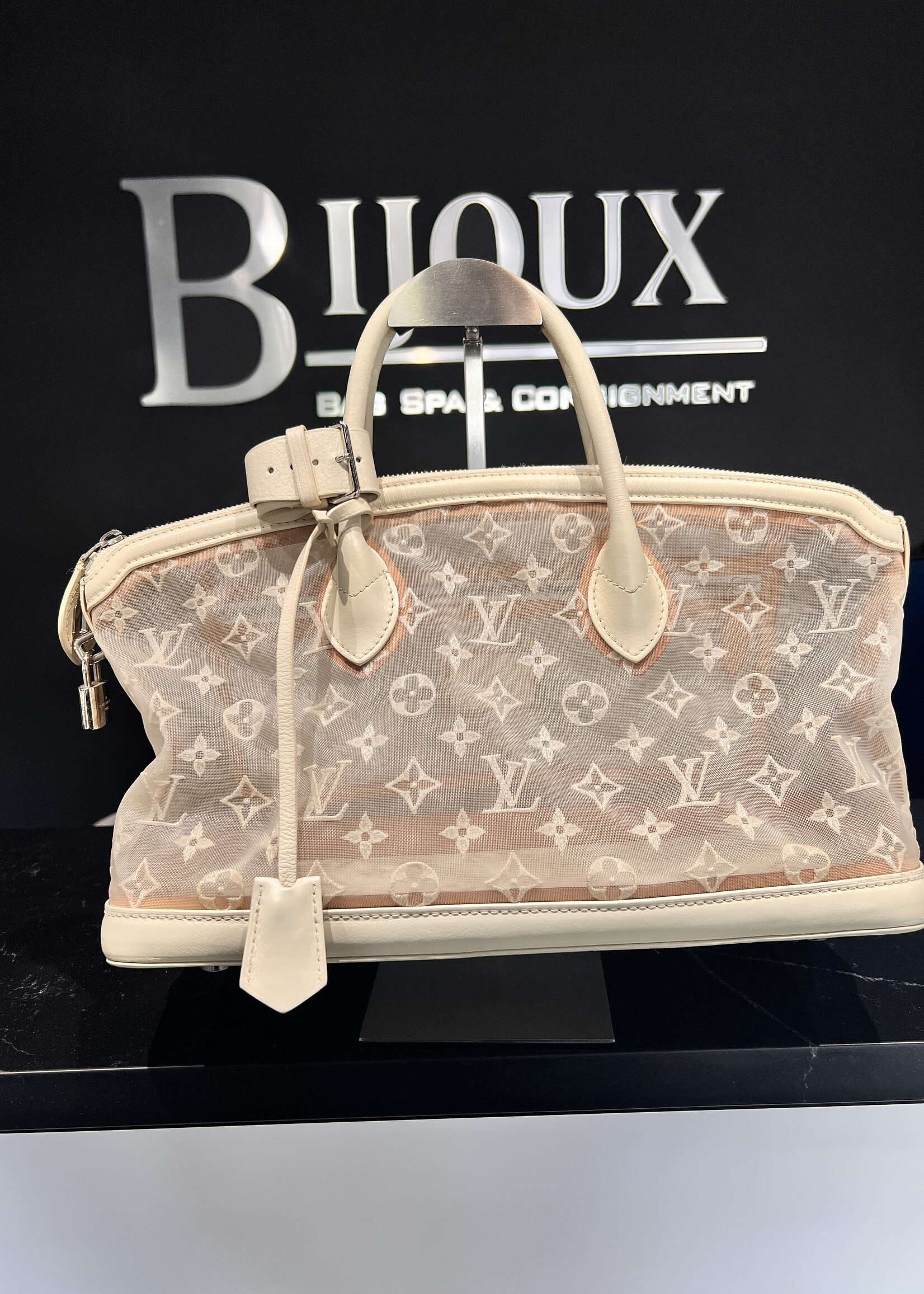 Louis Vuitton SOLD - Louis Vuitton Transparence Lock It