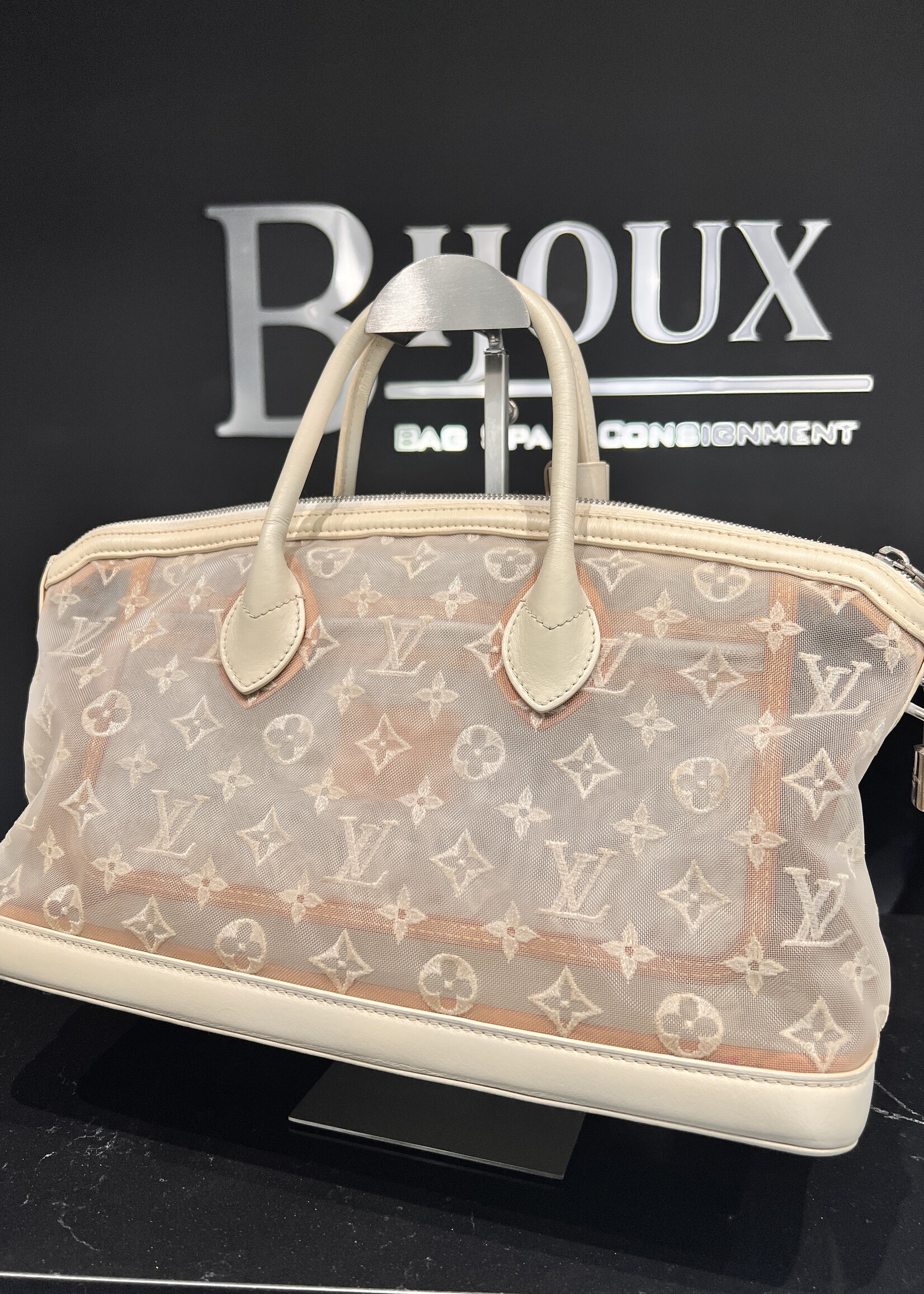Louis Vuitton SOLD - Louis Vuitton Transparence Lock It
