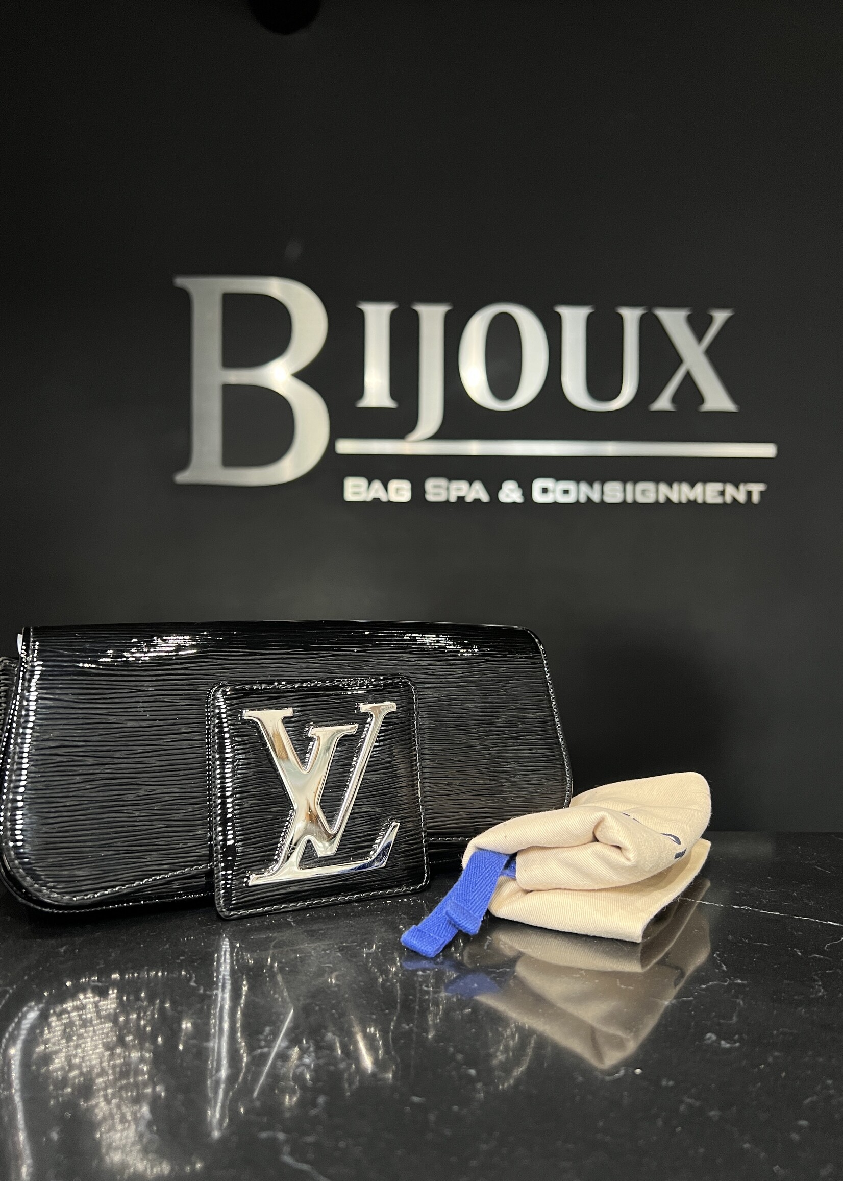 Louis Vuitton Louis Vuitton Black Epi Electric Sobe Clutch