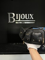 Louis Vuitton Louis Vuitton Monogram Embossed Utility Crossbody