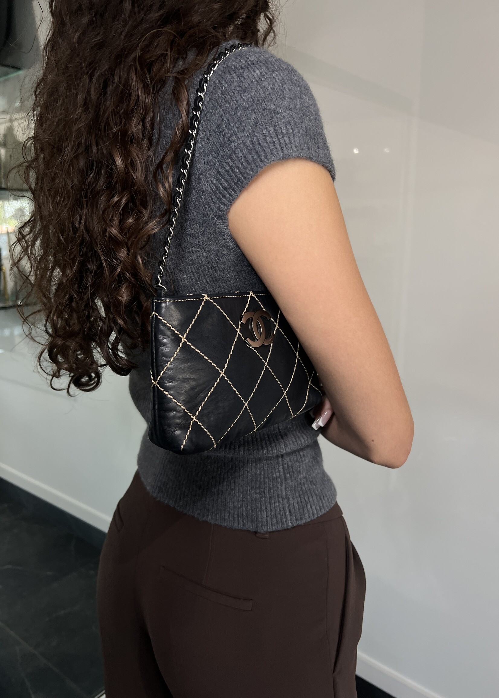 Chanel Chanel Calfskin Surpique Stitched Mini Pochette