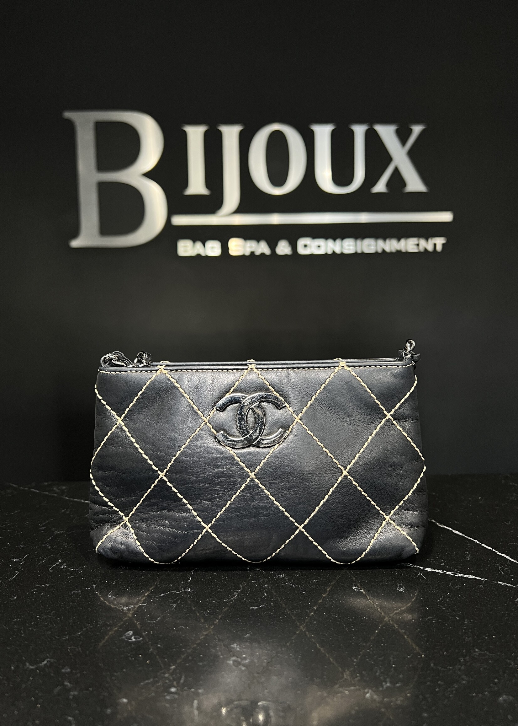 Chanel Chanel Calfskin Surpique Stitched Mini Pochette