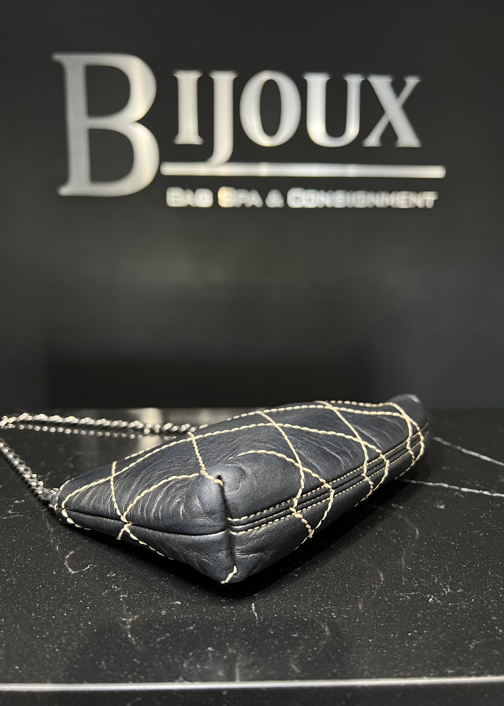 Chanel Chanel Calfskin Surpique Stitched Mini Pochette