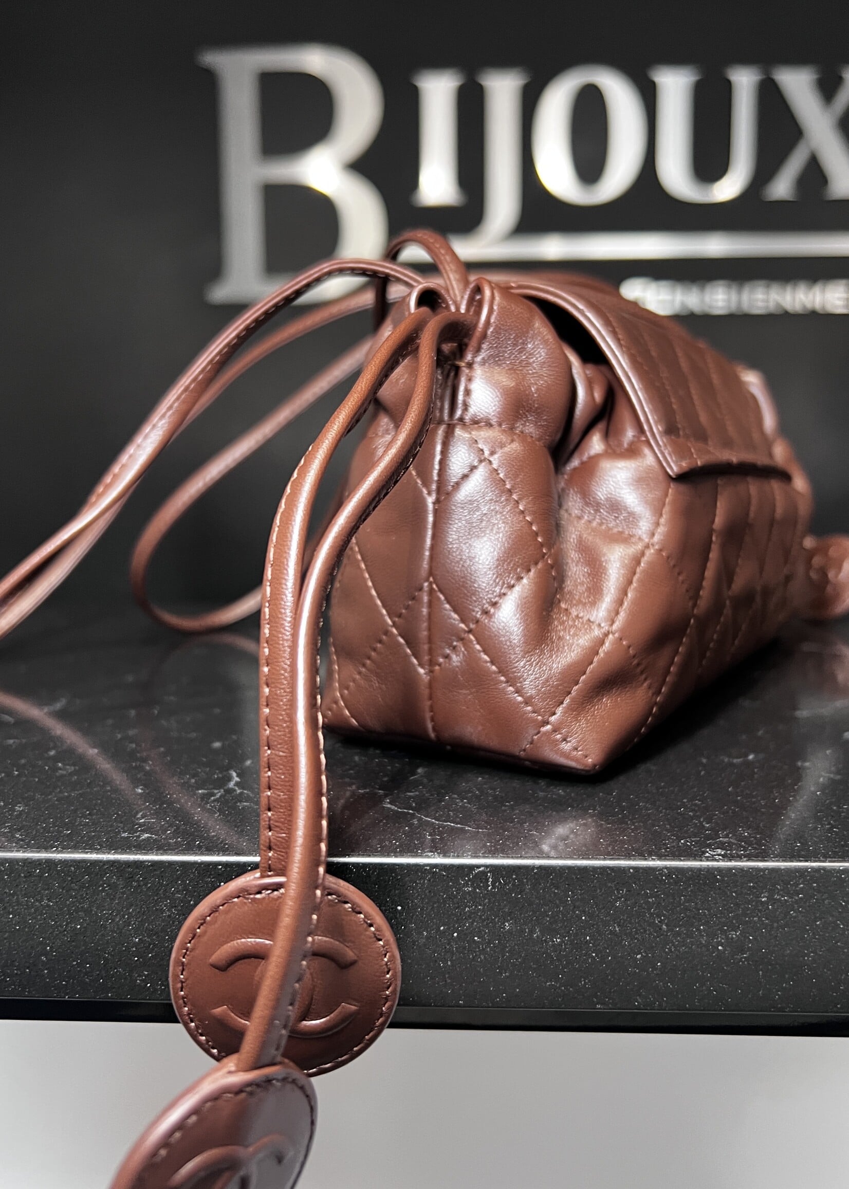 Chanel Chanel Drawstring Flap Bag with Leather Strap