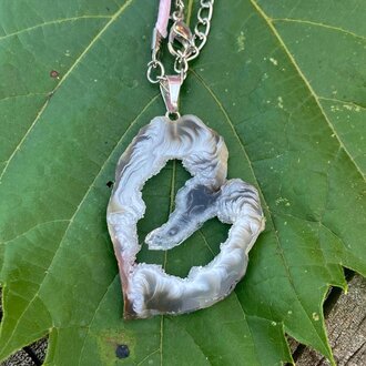 Luna Ignis Druzy Agate Geode Slice Pendant Necklace On Wax Cord Luna Ignis Druzy Agate Geode Slice Pendant Necklace On Wax Cord