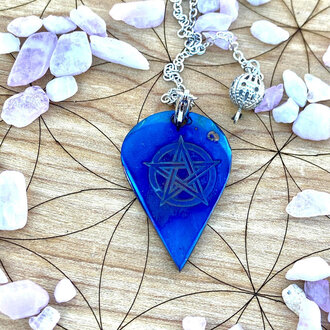 Luna Ignis Luna Ignis Pendulum Hand forged colorized iron with Pentacle Luna Ignis Luna Ignis Pendulum Hand forged colorized iron with Pentacle