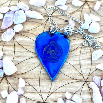 Luna Ignis Luna Ignis Pendulum Hand forged colorized iron with Triquetra Luna Ignis Luna Ignis Pendulum Hand forged colorized iron with Triquetra