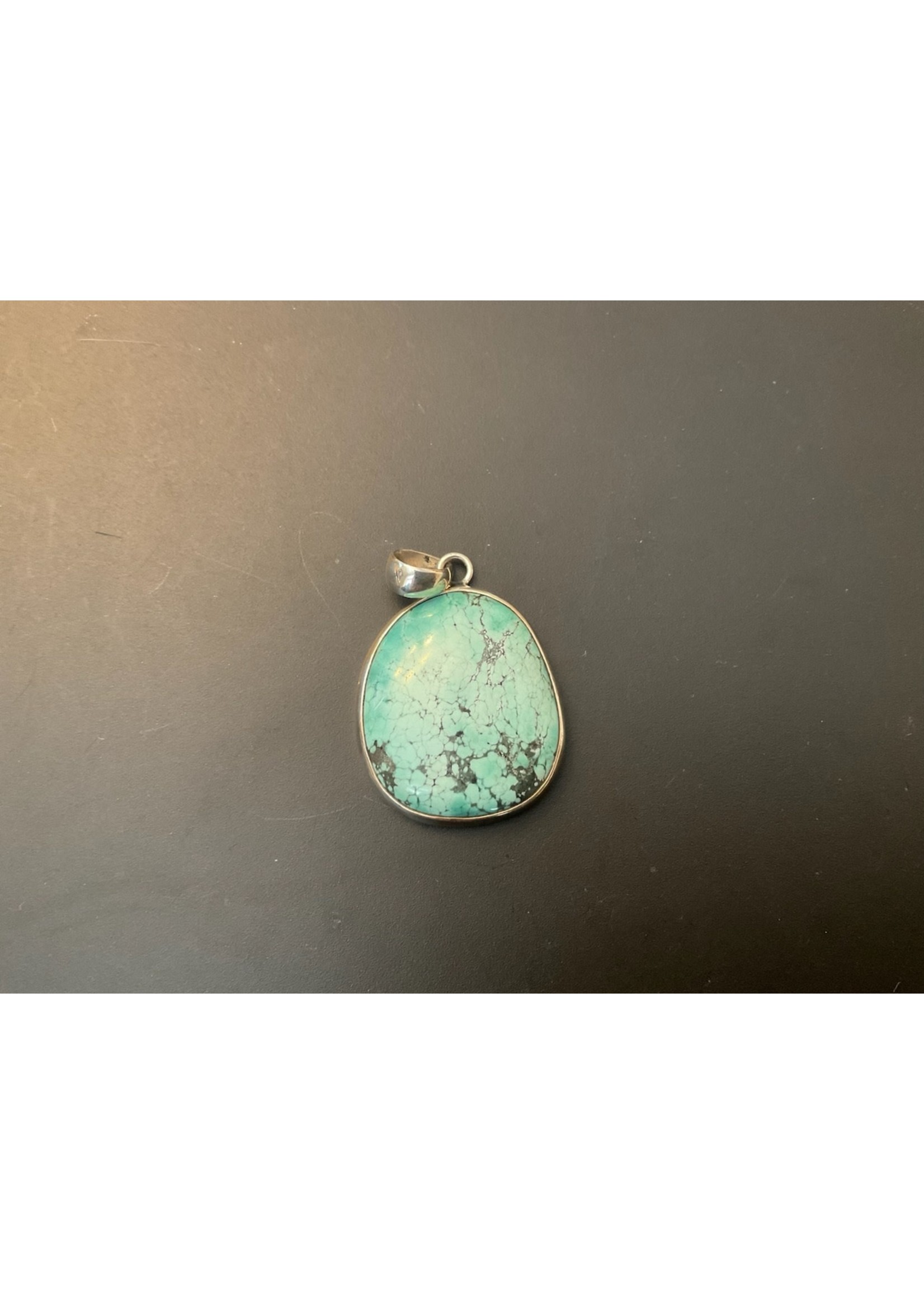 Turquoise Pendant set in Sterling - 1 1/2”