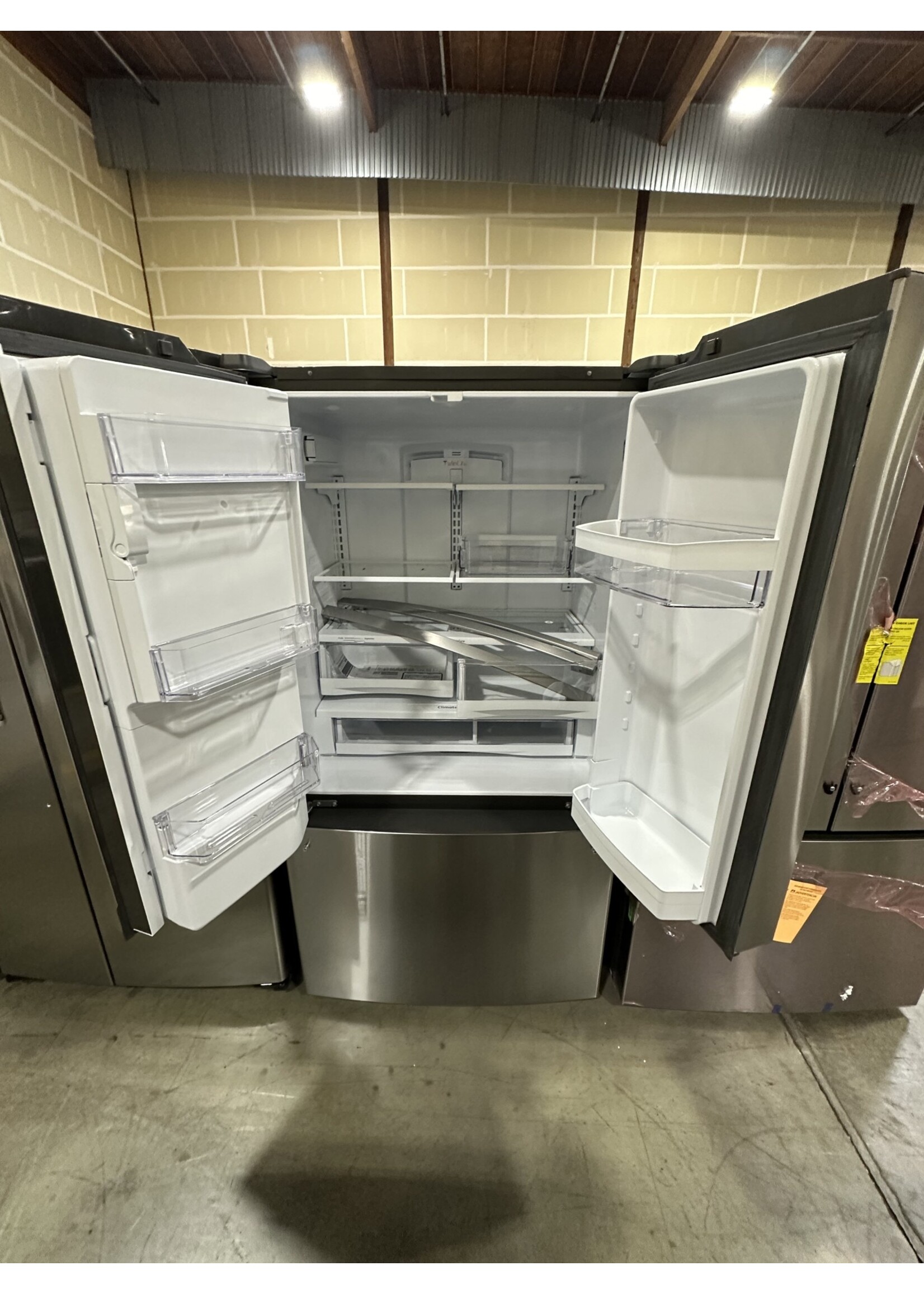 GE GE GYE22GYNFS 22.1 cu. ft. French Door Refrigerator in Fingerprint